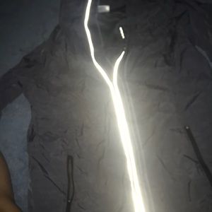 Thin rain coat, size medium, new without tags